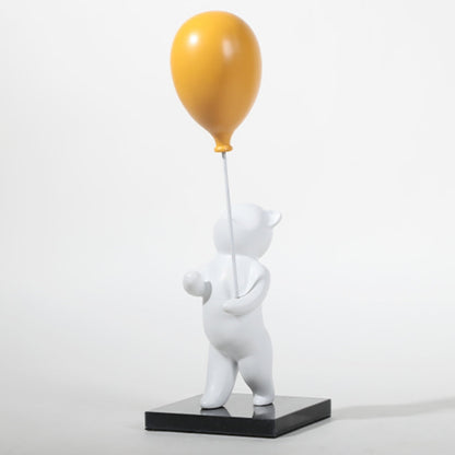 Whimsical Bear with Orange Balloon Figurine